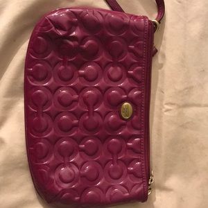 Shiny leather wristlet